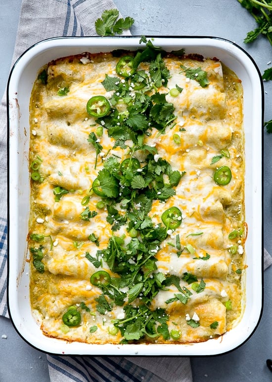 chicken enchiladas beautifully presented from an overhead angle